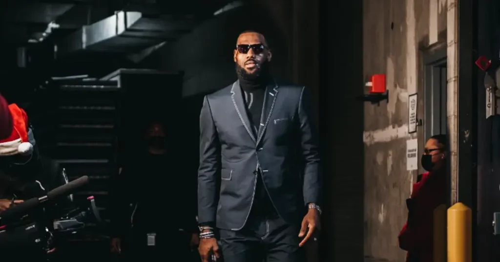 lebron james in a black men suit with sunglasses